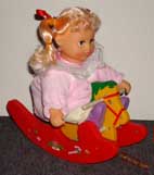 girl_rocking_horse